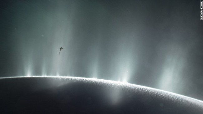 This illustration shows Cassini diving through the Enceladus plume in 2015. New ocean world discoveries from Cassini and Hubble will help inform future exploration and the broader search for life beyond Earth.