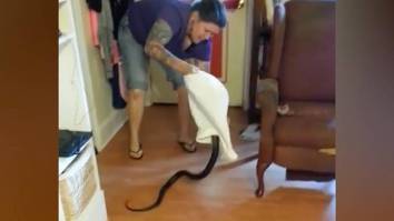 Watch This Lady Casually Wrangle A Huge Snake That Slithered Into Her Home