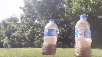 Archer Pulls Off The Craziest Trick Shot Ever And Hits Two Swinging Bottles With One Arrow