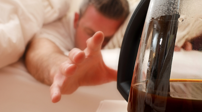 tired man coffee
