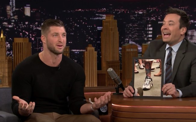 Tim Tebow reviews fan tattoos