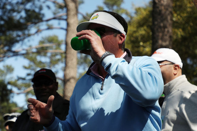 fan chugging beer the masters