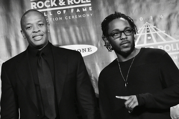 Dr. Dre (L) and Kendrick Lamar pose in the press room at the 31st Annual Rock And Roll Hall Of Fame Induction Ceremony at 