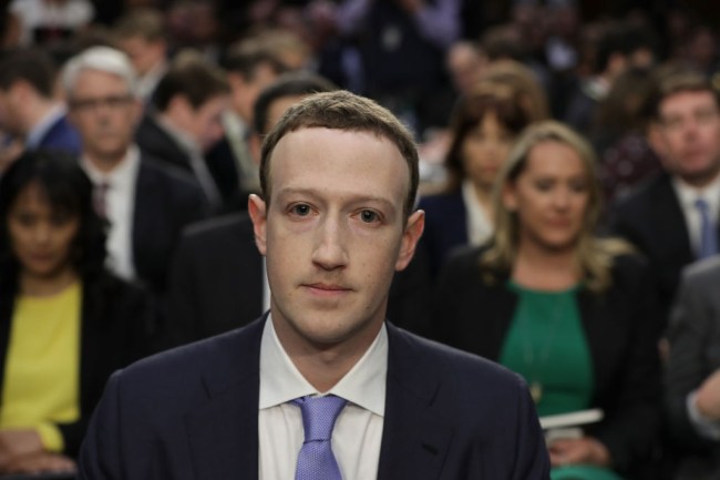 WASHINGTON, DC - APRIL 10: Facebook co-founder, Chairman and CEO Mark Zuckerberg arrives to testify before a combined Senate Judiciary and Commerce committee hearing in the Hart Senate Office Building on Capitol Hill April 10, 2018 in Washington, DC. Zuckerberg, 33, was called to testify after it was reported that 87 million Facebook users had their personal information harvested by Cambridge Analytica, a British political consulting firm linked to the Trump campaign.