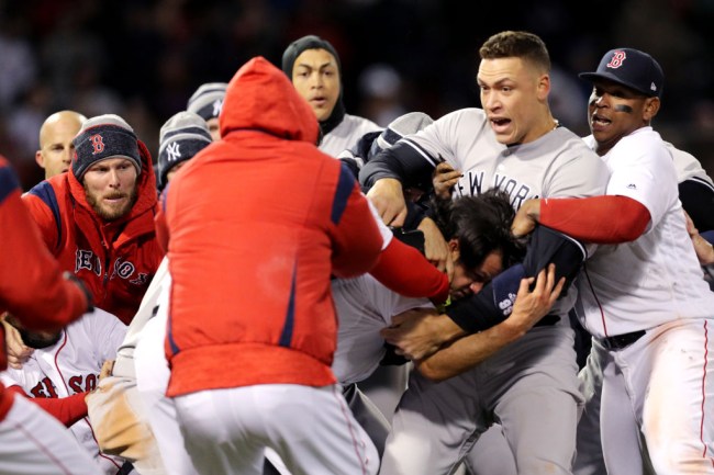 BOSTON, MA - APRIL 11: From left, Chris Sale #41 of the Boston Red Sox, Giancarlo Stanton #27 of the New York Yankees, Aaron Judge #99 of the New York Yankees and Rafael Devers #11 of the Red Sox work to separate a fight involving Joe Kelly #56 of the Boston Red Sox and Tyler Austin #26 of the New York Yankees during the seventh inning at Fenway Park on April 11, 2018 in Boston, Massachusetts. Austin rushed the mound after being struck by a pitch thrown by Kelly.