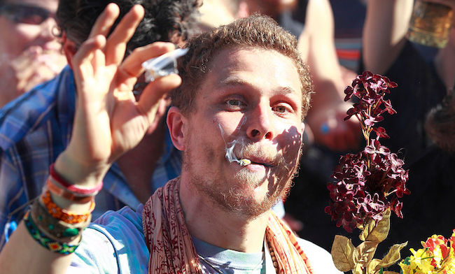 man smoking a joint