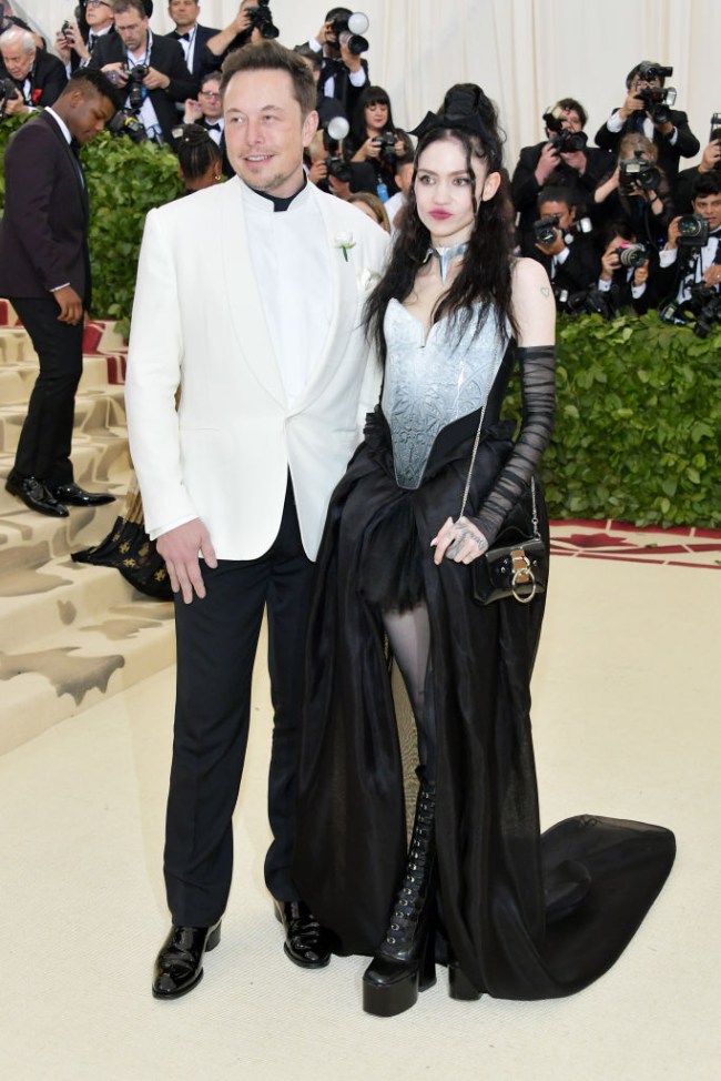 Elon Musk and Grimes attend the Heavenly Bodies: Fashion & The Catholic Imagination Costume Institute Gala at The Metropolitan Museum of Art on May 7, 2018 in New York City. (Photo by Neilson Barnard/Getty Images)