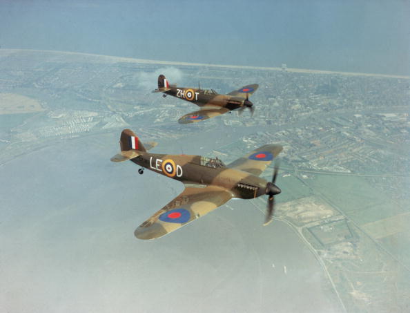 A Hawker Hurricane IIc LF363 (foreround), and a Supermarine Spitfire IIa P7350 with markings as they appeared in Guy Hamilton's film 'Battle Of Britain', 1969. Built in 1940, the Spitfire took part in the Battle of Britain, serving with 266 Squadron and 603 (City of Edinburgh) AuxAF Squadron. The Hurricane was built in 1944 and is believed to be the last Hurricane to enter service with the RAF. Both aircraft are still flying with the Battle of Britain Memorial Flight. (Photo by Fox Photos/Getty Images)