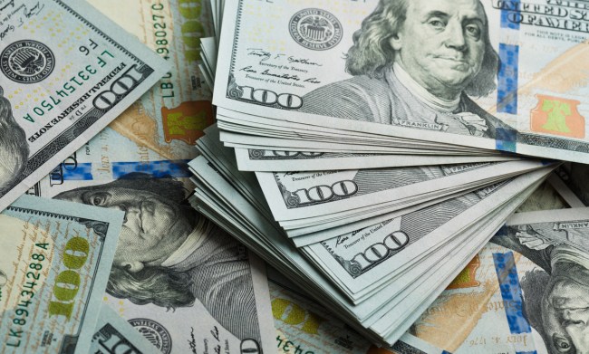 pile of hundred dollar bills