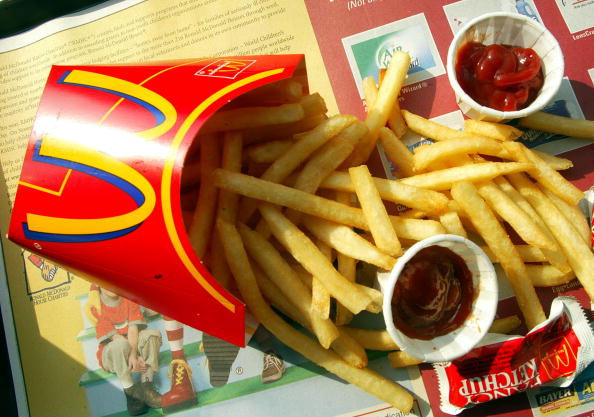 NEW YORK - SEPTEMBER 3: French fries are shown in a McDonald's restaurant on First Avenue September 3, 2002 in New York City. McDonald's announced plans to use a new cooking oil for its french fries that it says will cut in half the trans-fatty acid levels while increasing the amount of the more beneficial polyunsaturated fat. (Photo by Mario Tama/Getty Images)