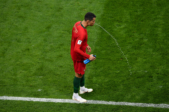 SARANSK, RUSSIA - JUNE 25: Cristiano Ronaldo of Portugal spits water during the 2018 FIFA World Cup Russia group B match between Iran and Portugal at Mordovia Arena on June 25, 2018 in Saransk, Russia. (Photo by Hector Vivas/Getty Images)