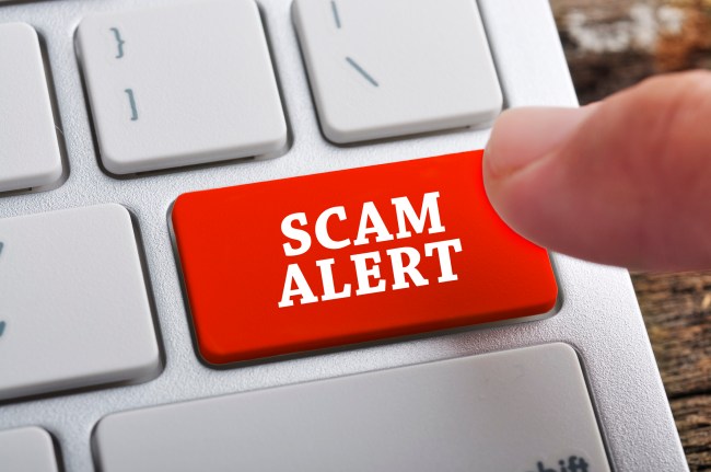 email scam alert button on computer