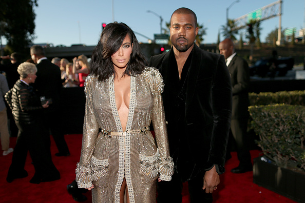 TV personality Kim Kardashian (L) and recording artist Kanye West attend The 57th Annual GRAMMY Awards at the STAPLES Center on February 8, 2015 in Los Angeles, California. (Photo by Christopher Polk/WireImage)