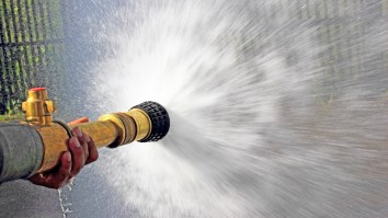 Firenado Sucks Fire Hose Into The Vortex While Throwing Burning Logs At The Firemen