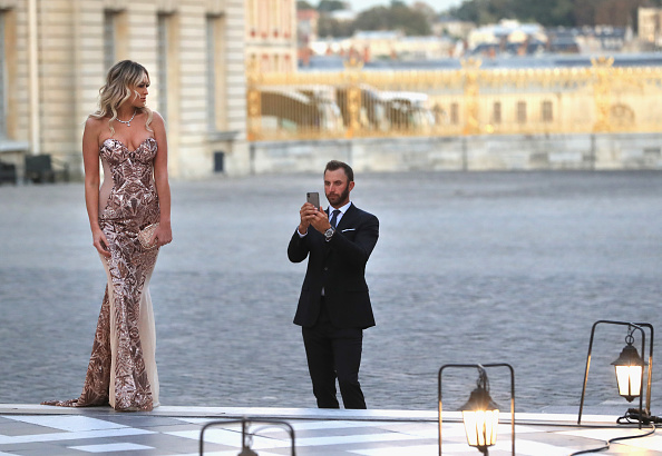 VERSAILLES, FRANCE - SEPTEMBER 26:  Dustin Johnson of the United States and his partner Paulina Gretzky arrive at the Ryder Cup Gala dinner at the Palace of Versailles ahead of the 2018 Ryder Cup on September 26, 2018 in Versailles, France.  (Photo by Andrew Redington/Getty Images)