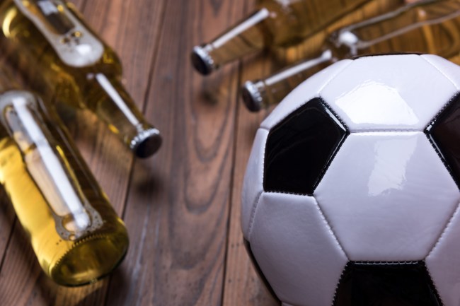 soccer player celebrate goal chugs beer