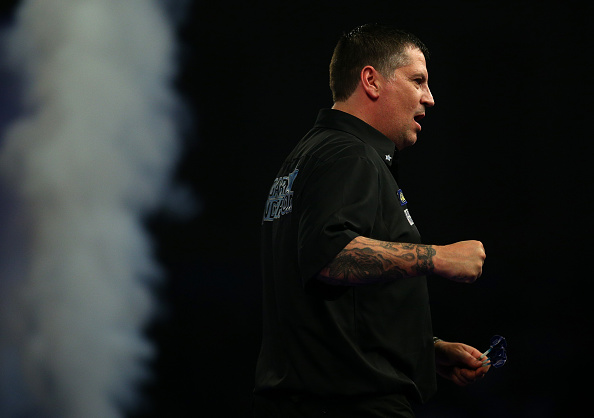 LONDON, ENGLAND - JANUARY 02: Gary Anderson of Scotland celebrates winning his semi-final match against Jelle Klaasen of Holland during the 2016 William Hill PDC World Darts Championships on Day Four at Alexandra Palace on January 02, 2016 in London, England. (Photo by Charlie Crowhurst/Getty Images)