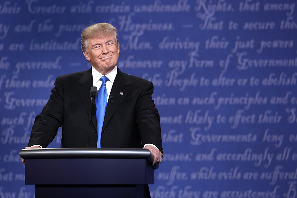 HEMPSTEAD, NY - SEPTEMBER 26:  Republican presidential nominee Donald Trump smiles during the Presidential Debate at Hofstra University on September 26, 2016 in Hempstead, New York.  The first of four debates for the 2016 Election, three Presidential and one Vice Presidential, is moderated by NBC's Lester Holt.  (Photo by Win McNamee/Getty Images)