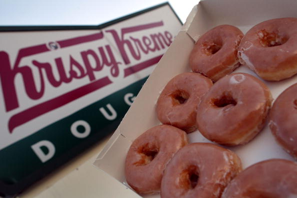 MIAMI - MAY 17:  Glazed Krispy Kreme doughnuts are seen May 17, 2004 in Miami, Florida. Krispy Kreme Doughnuts Inc. last week said that the low-carb diet trend has hurt sales and they now face shareholder lawsuits alleging it misled investors about the direction its business was headed.  (Photo by Joe Raedle/Getty Images)