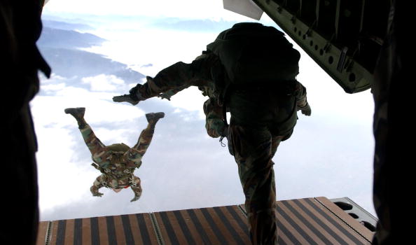 IN FLIGHT - UNDATED PHOTO: Members of the Headquarters Support Company 3rd Bn, 7th Special Forces Group (Airborne) at Ft. Bragg, N.C., participate in a High Altitude/Low Opening jump from a Chilean C-255 aircraft. More than 30 paratroopers from nine different countries participated in the multinational airdrop during Cabanas 2002 Chile. Cabanas 2002 Chile is a multinational combined readiness training exercise centered around peacekeeping operational tasks. This exercise provides an opportunity for over 1,300 military and civilian personnel from Argentina, Bolivia, Brazil, Chile, Colombia, Ecuador, Paraguay, Peru, Uruguay, and the United States to increase their state of readiness in combined multinational peacekeeping operations and a forum to encourage human rights. (Photo by Staff Sgt. Cherie A. Thurlby/USAF/Getty Images)