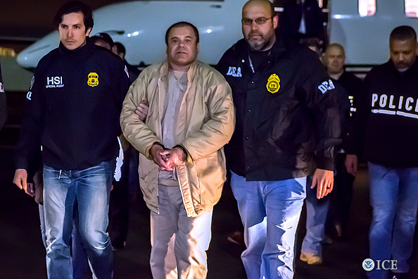 NEW YORK, NY - JANUARY 19, 2017: In this handout provided by U.S. Immigration and Customs Enforcement, Federal authorities announced Friday that Joaquin Archivaldo Guzman Loera, known by various aliases including, âEl Chapo,â? will face charges filed in Brooklyn, New York, following his extradition to the United States from Mexico. Guzman Loera arrived in New York under heavy escort by special agents with U.S. Immigration and Customs Enforcement (ICE) Homeland Security Investigations and the Drug Enforcement Administration (DEA) and other authorities. (Photo by Charles Reed/U.S. Immigration and Customs Enforcement via Getty Images)