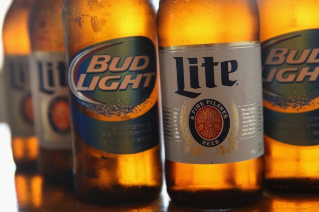 CHICAGO, IL - SEPTEMBER 15: In this photo illustration, bottles of Miller Lite and Bud Light beer that are products of SABMiller and Anheuser-Busch InBev (respectively) are shown on September 15, 2014 in Chicago. Illinois. Shares of SABMiller have surged to an all-time high today on speculation of a takeover bid by Anheuser-Busch InBev, the world's largest brewer. (Photo Illustration by Scott Olson/Getty Images)