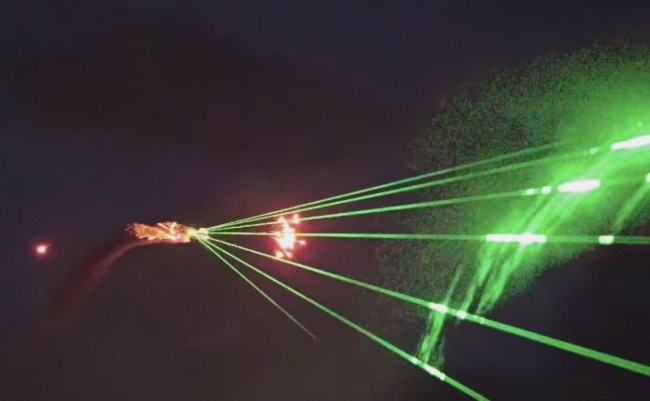 plane shoots lasers and fireworks