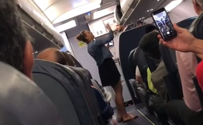 woman kicked off spirit flight for twerking fighting