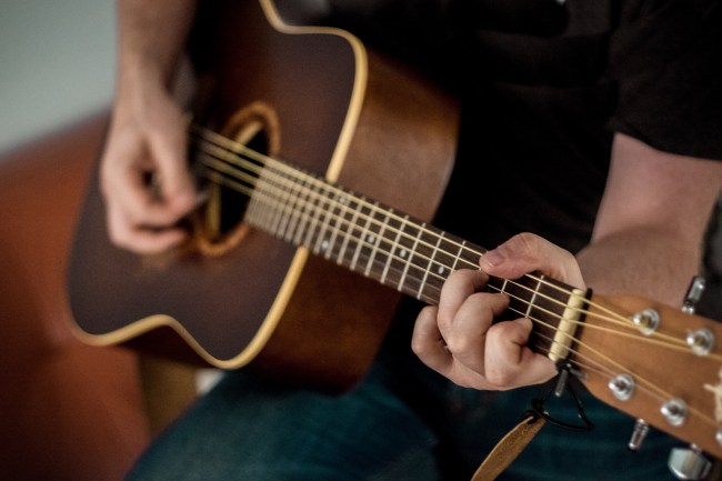 learning to play guitar