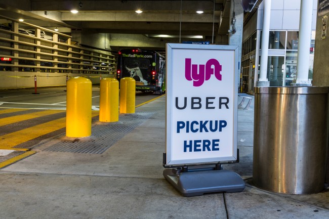Ride sharing companies Lyft and Uber pickup spot at the airport. Lyft and Uber have replaced many Taxi cabs for transportation