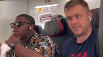VIDEO: Woman Kicked Off Plane After Giving Boyfriend A Tongue-Lashing For The Ages, Attacking Him With A Laptop Bag