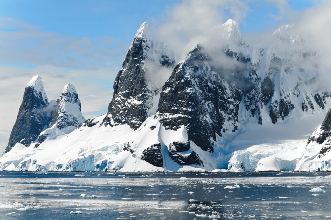 UFO hunters claim they've found signs of an alien invasion or an alien face in Google Earth photos of Antarctica.