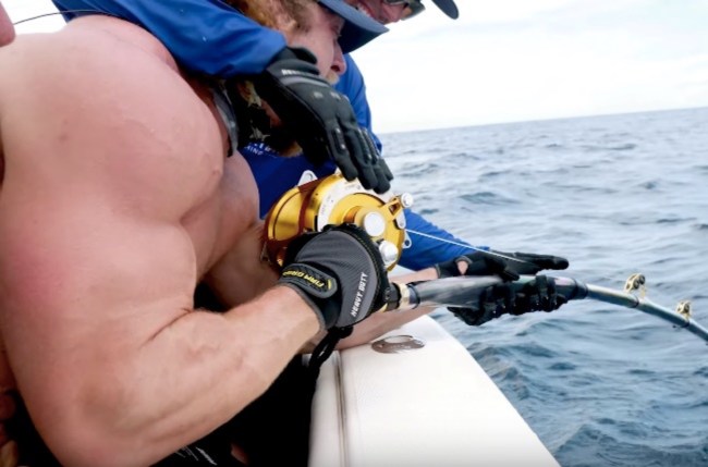 weightlifters fishing for giant Goliath Grouper