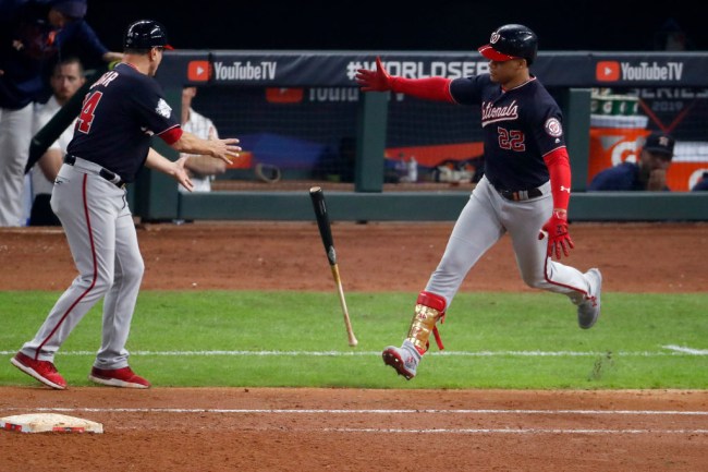 juan soto carries bat to first base