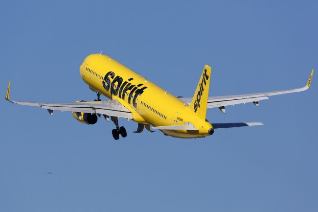 Drunk man pukes in woman's hair causing all of the passengers to disembark from Spirit Airlines plane and then man and woman are caught in bathroom causing another delay.