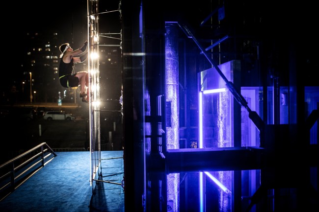Marcin Dzieński speed climbing racing an elevator
