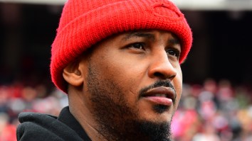 Carmelo Anthony’s Absurd Outfit At The Syracuse-Virginia Game Has Become A Colorful Meme