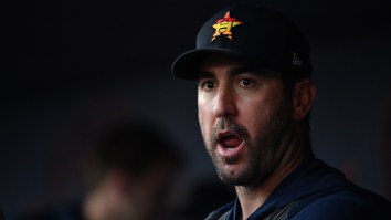 Security Steals Sign From A Houston Astros Heckler As The Team Was Being Booed While Taking The Field For Spring Training