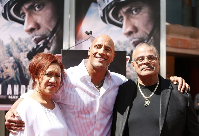 Dwayne 'The Rock' Johnson fights back tears as he delivers heartfelt eulogy to his former wrestler father Rocky "Soulman" Johnson.
