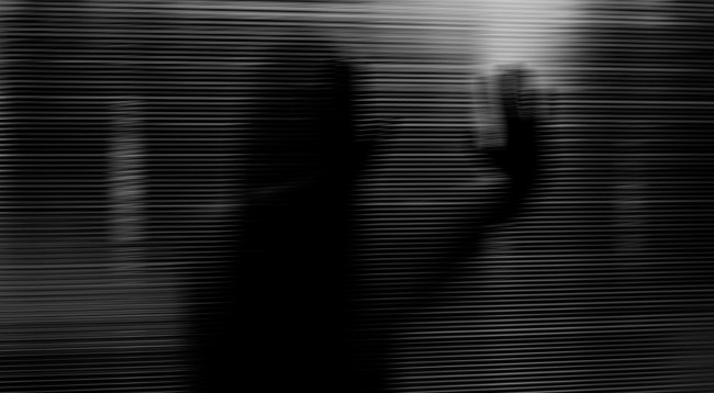 Hotel Surveillance Camera Catches Shadow Figure On Video