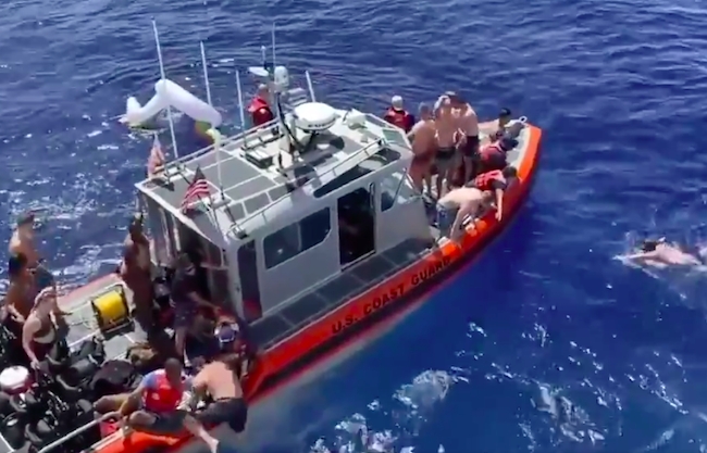 coast guard opens fire shark