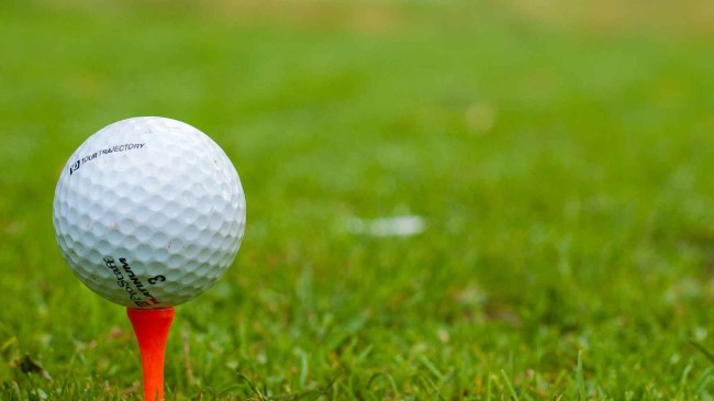 bullet hits golf ball