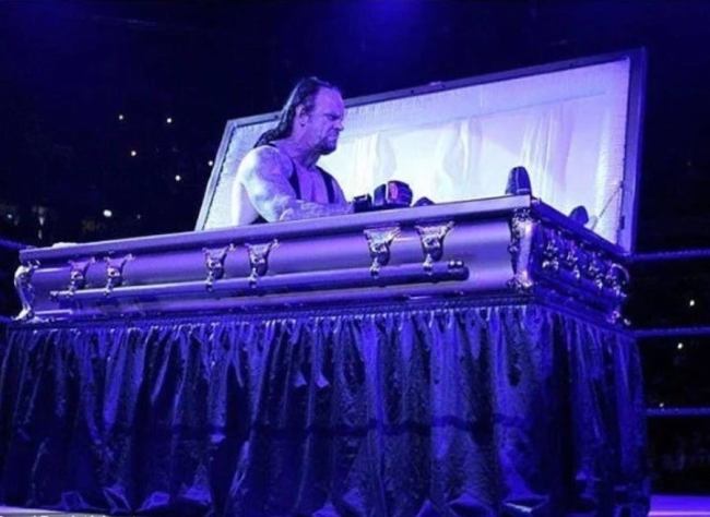 Undertaker Naps In Coffin