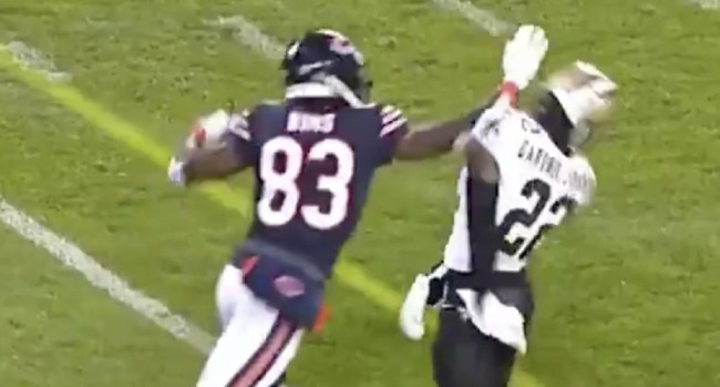 Javon Wims punching C.J. Garder-Johnson