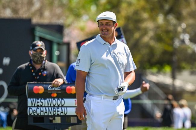 bryson dechambeau workout with us open trophy