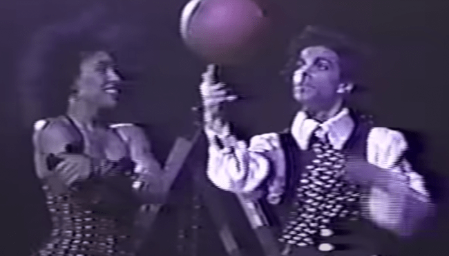 prince playing basketball during concert
