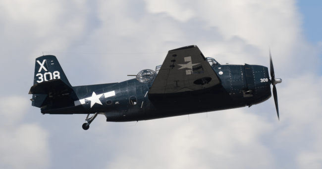 WW2 Plane Crashes Sea Behind Florida Woman Doing Maternity Shoot