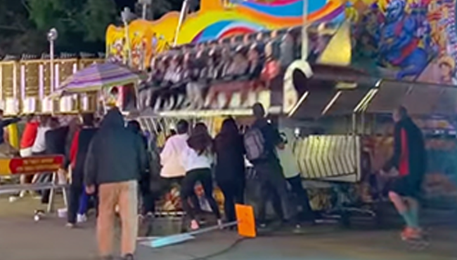 bystanders prevent carnival ride tipping over