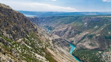 WILD Video Shows Glorified Porch Swing Snap Above 6,300 Foot Canyon In Russia, Women Walk Away With Minor Injuries