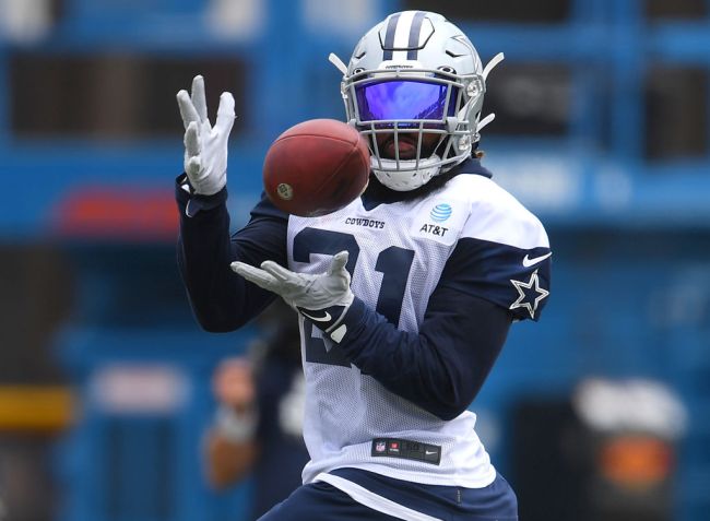 OXNARD, CA - JULY 24: Running back Ezekiel Elliott #21 of the Dallas Cowboys catches a pass during training camp at River Ridge Complex on July 24, 2021 in Oxnard, California